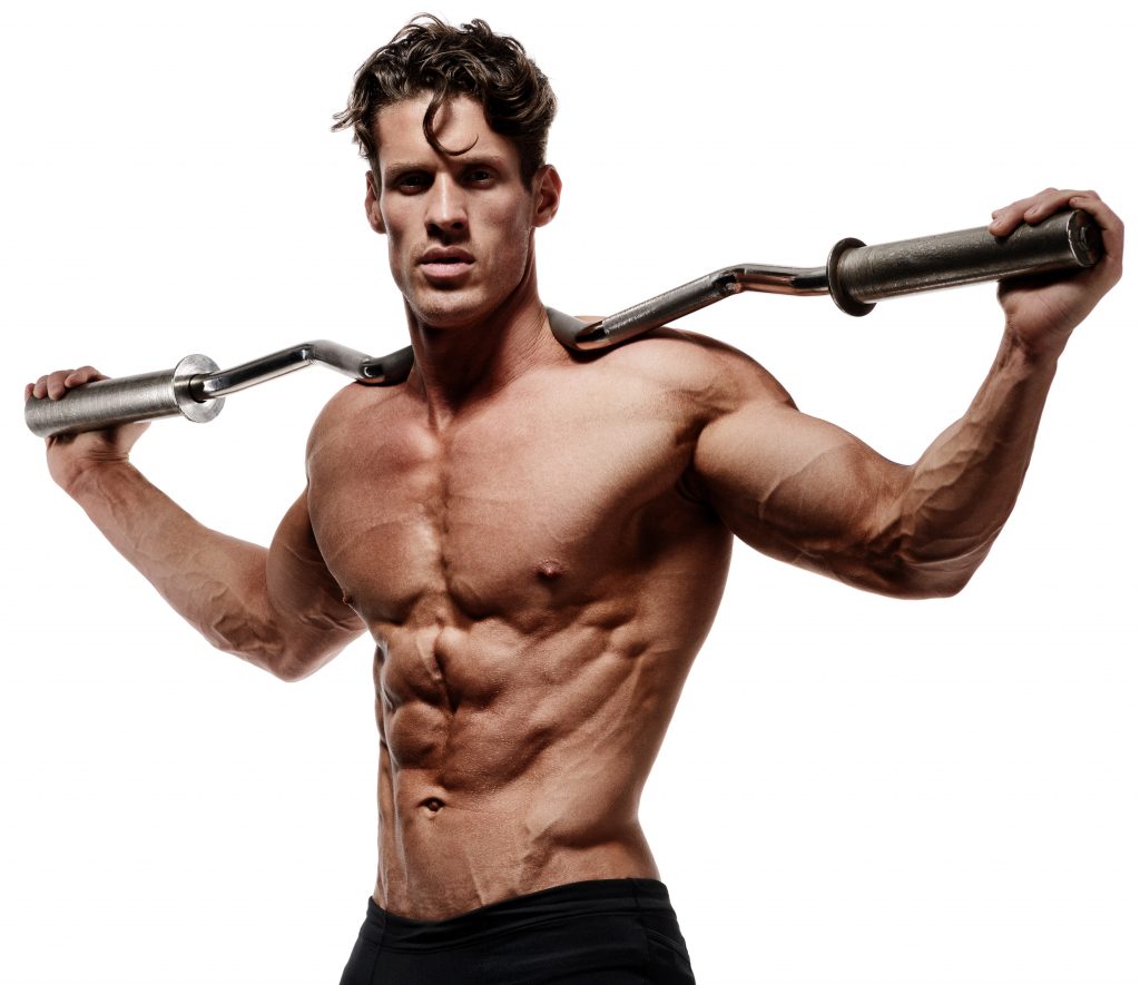 Muscular bodybuilder man doing exercises isolated over white background